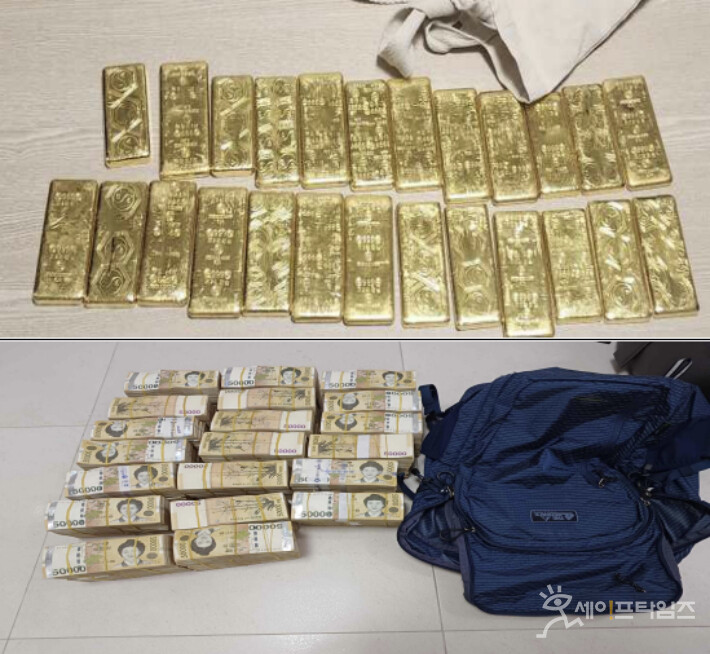 ▲ 부동산 프로젝트파이낸싱 대츨 관련 자금 횡령 혐의로 재판받고 있는 BNK경남은행 간부 이씨가 환전한 골드바와 현금. ⓒ 서울중앙지검